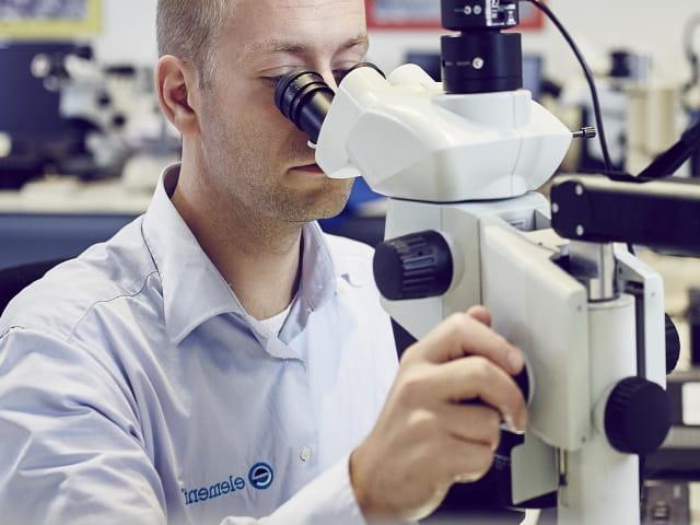 Metallurgical testing services being performed by an expert metallurgist within Elements state of the art testing laboratory.